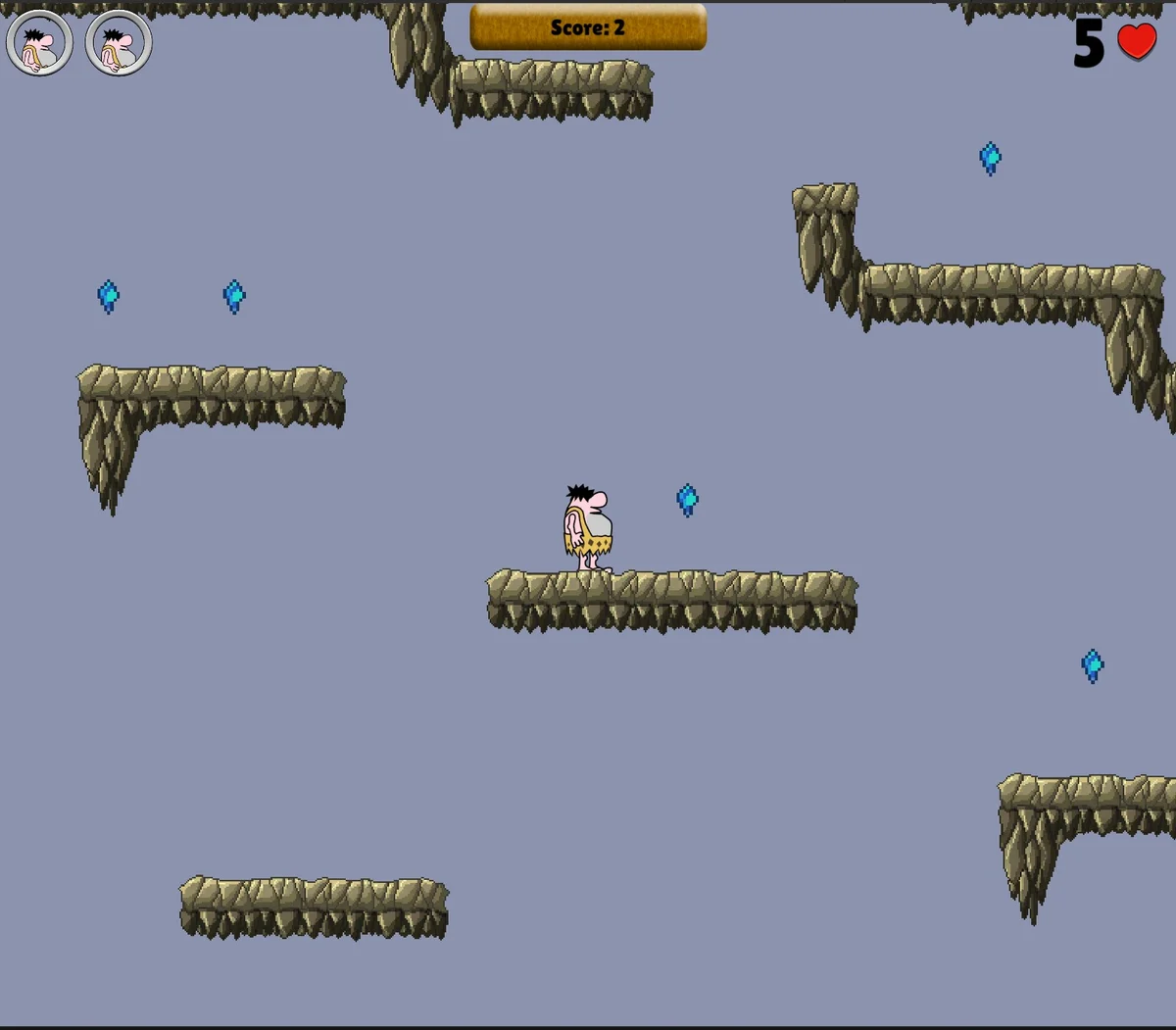 Og stands on a rocky platform among floating blue gems in the two-dimensional platformer.
